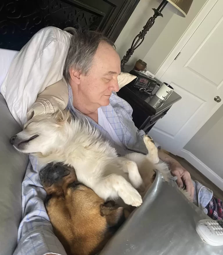 Woman Walks In On Her Dad Napping With All The Neighbor Dogs